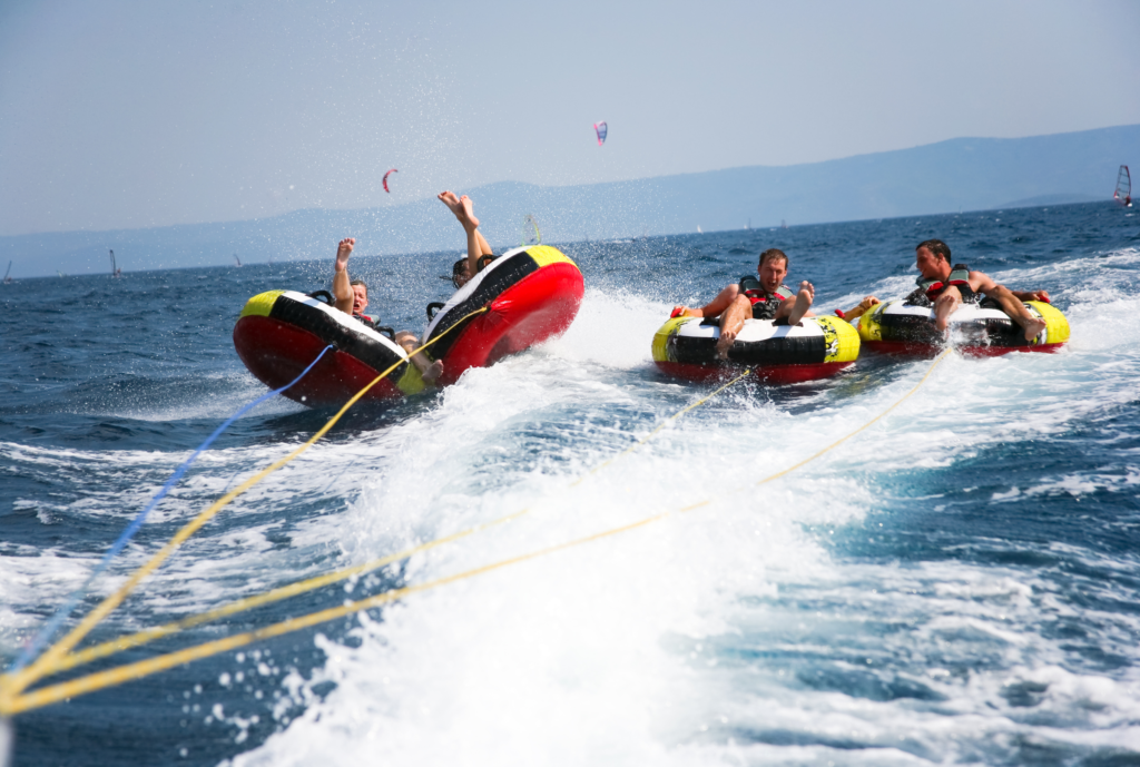 Water Tubing in Squam Lake | New Hampshire Watersports Boat Charter | Family Activities near Squam Lake