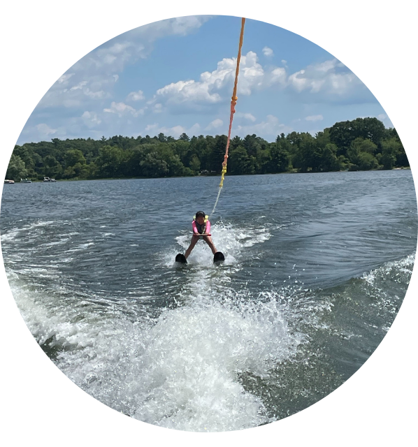 Young girl waterskiing in Squam Lake, New Hampshire | New Hampshire Watersports