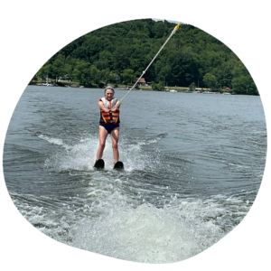 Young girl waterskiing in Squam Lake, New Hampshire | New Hampshire Watersports